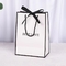 140gsm Kontrastowy kolor Czarno-biała papierowa torba na prezent z uchwytem w jodełkę