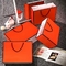 Buty Niestandardowe papierowe torby na zakupy Brązowe Srebrne Torby z kości słoniowej 250gsm