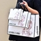 Odporne na tłuszcz drukowane papierowe torby na zakupy Niestandardowe torby papierowe z logo