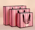 Różowe paski Pantone CMYK kosmetyczne torby papierowe na prezenty zwrotne